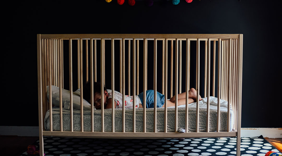 early bedtime baby in crib