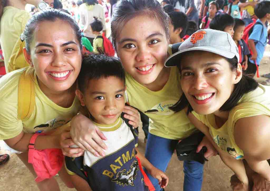 Filipina celebrity mom and daughters in yellow
