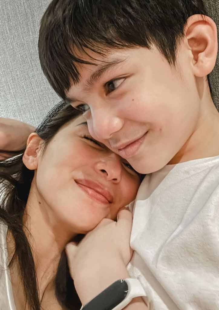 mom and son close up in white