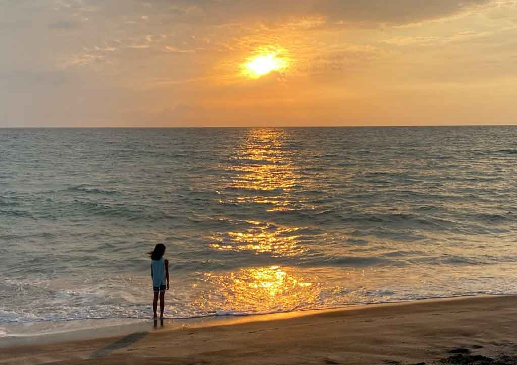 homeschooling myths girl standing in beach
