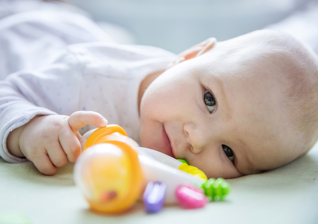 Rattle tug is a game you can play with your babies to improve their grip.