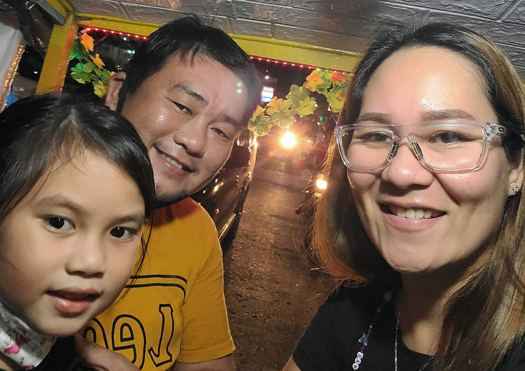 Mae Virtucio with her husband Philip and daughter Veira