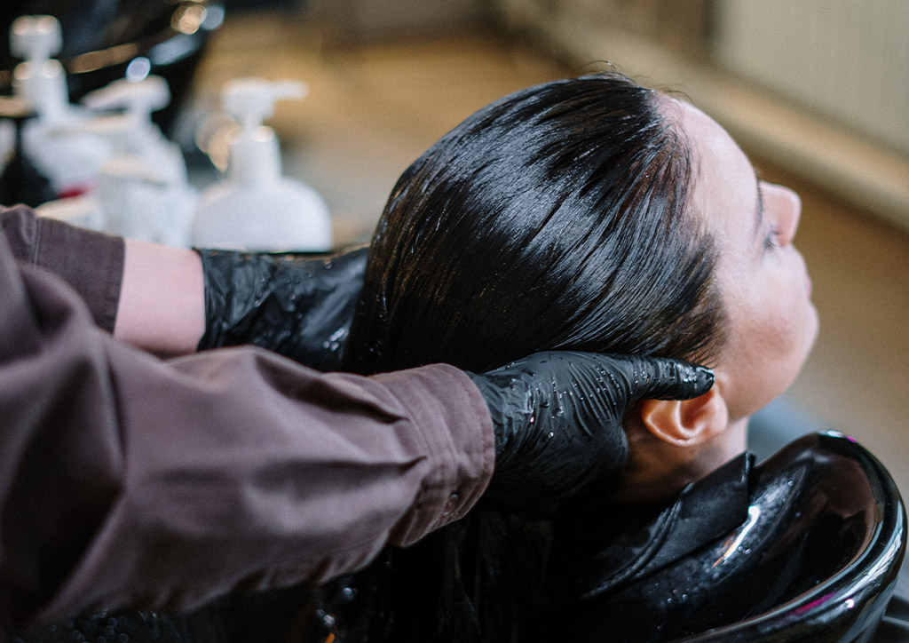 Getting a hair treatment.