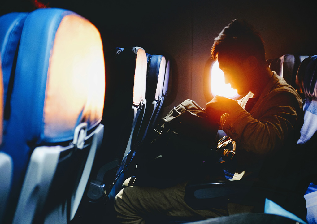 A Filipino in a plane about to migrate.