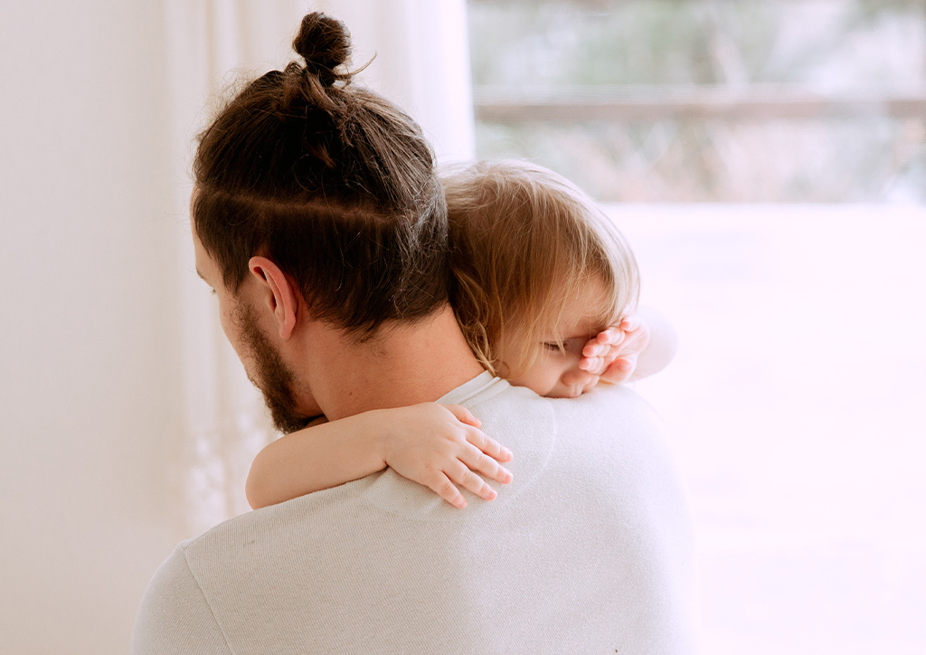 A dad and his son crying