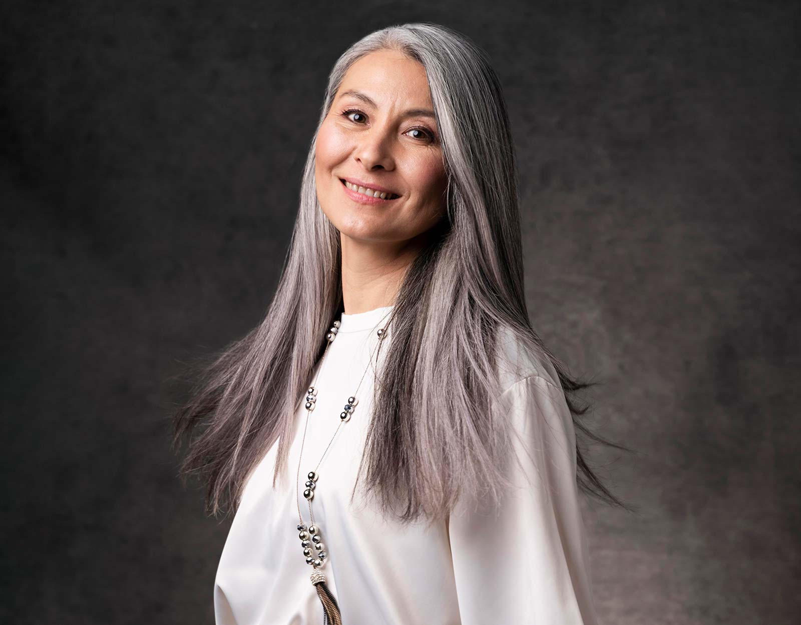 A woman with white hair