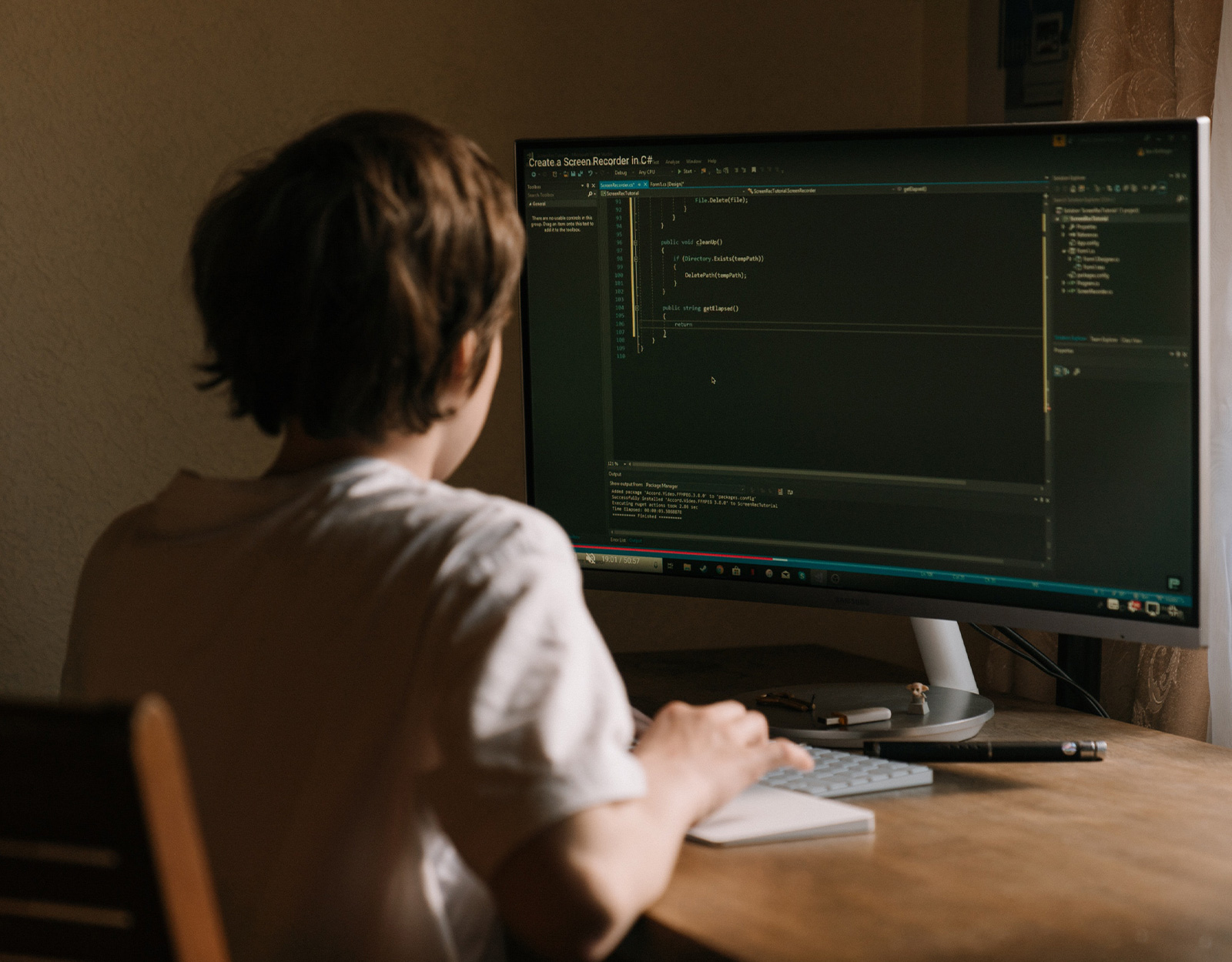 A kid during coding class