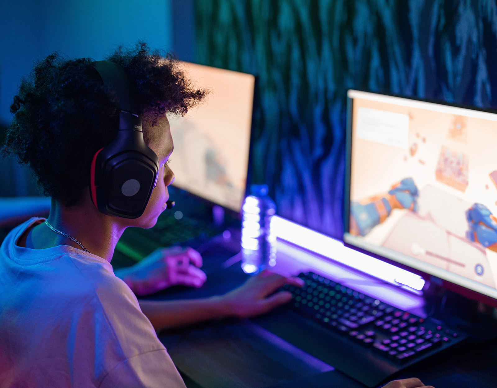 A kid playing a video game on the computer