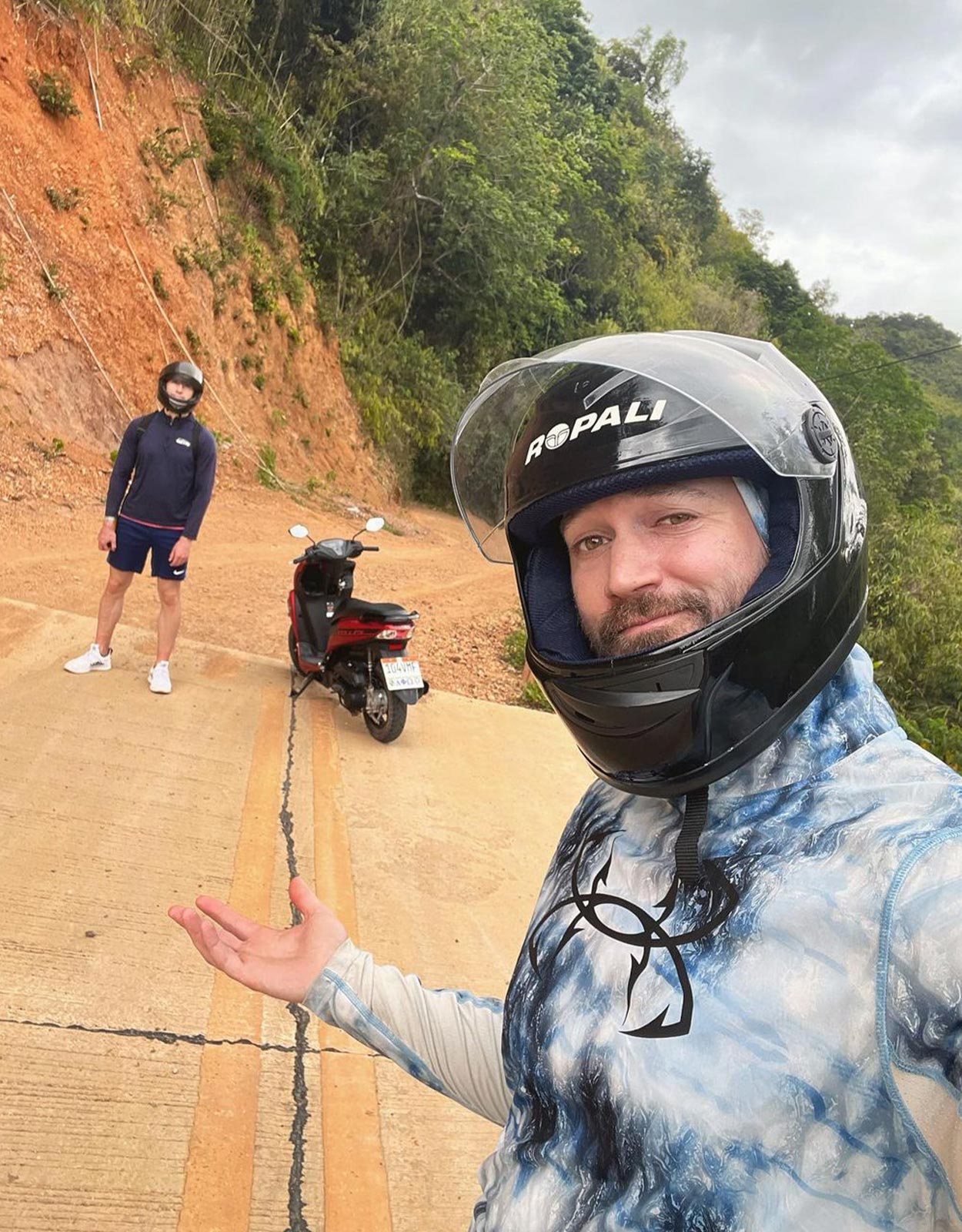 Stevin John showing off a motorcycle in Philippines