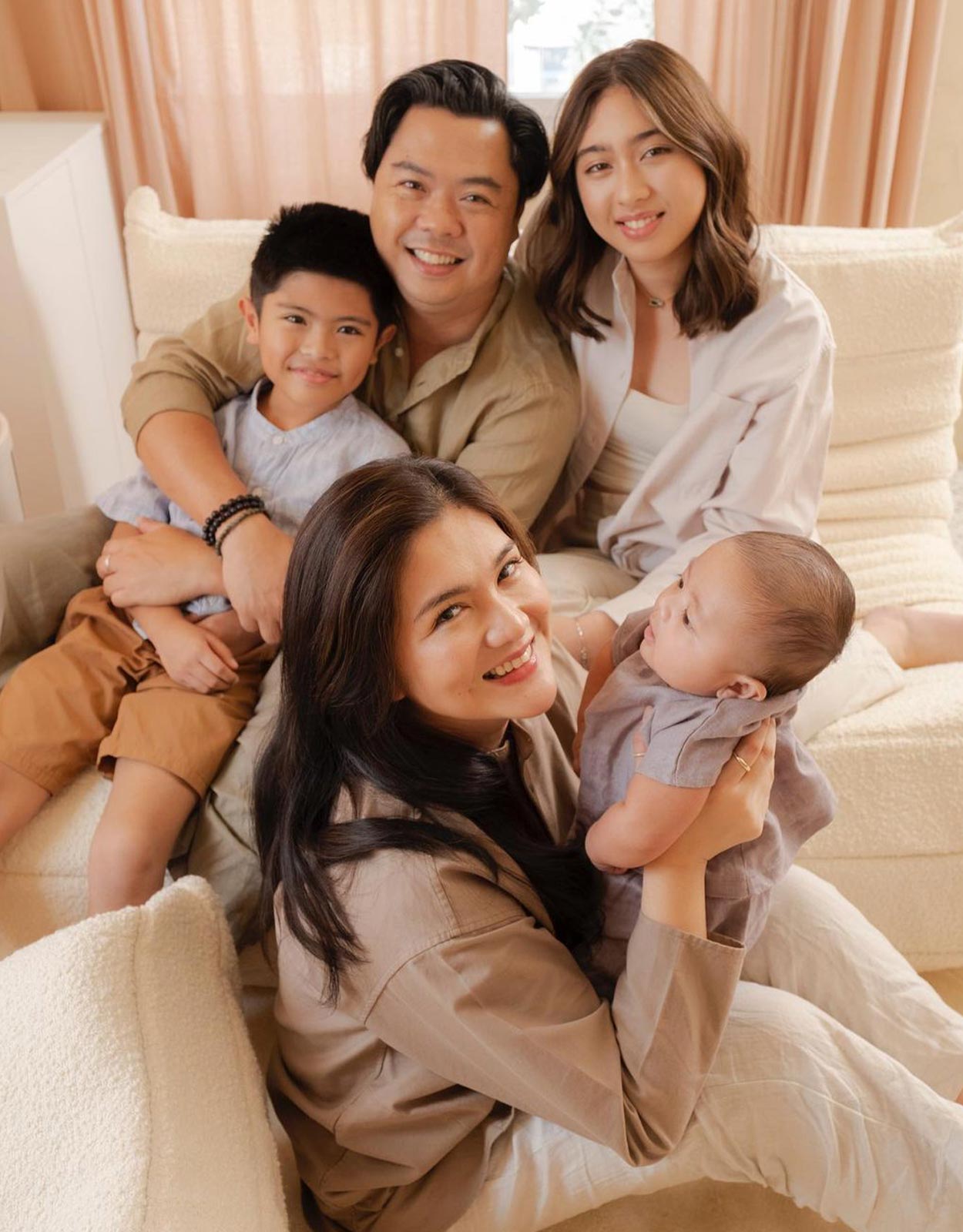 Dimples Romana with her family