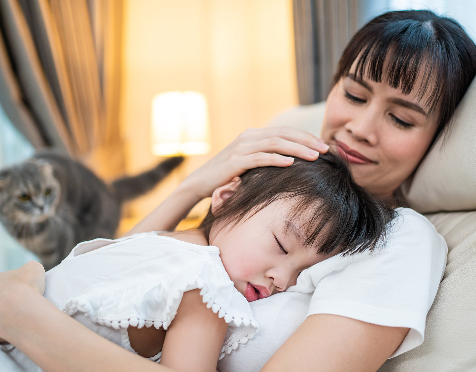 A mom and baby co-sleeping