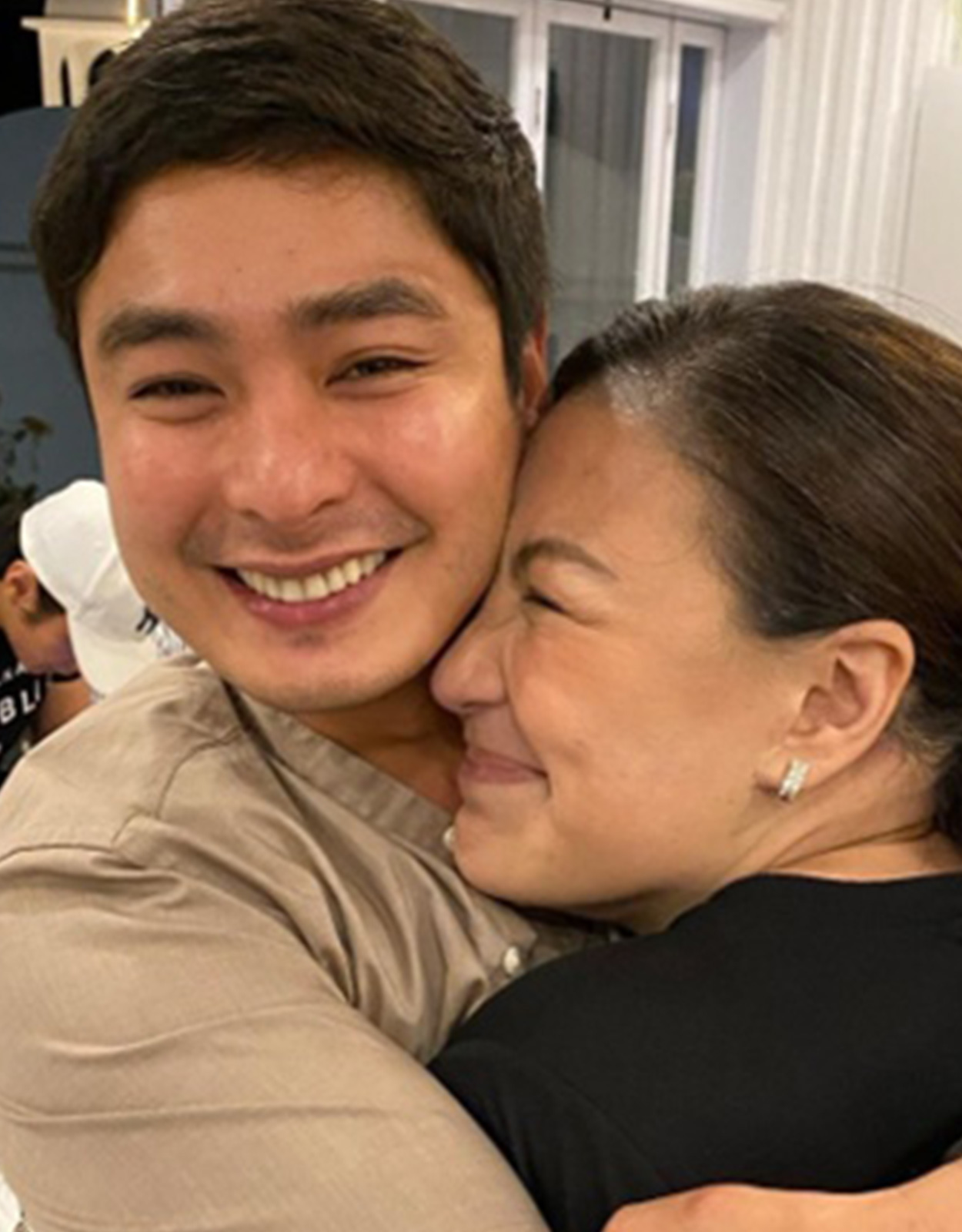 Coco Martin hugging Sharon Cuneta
