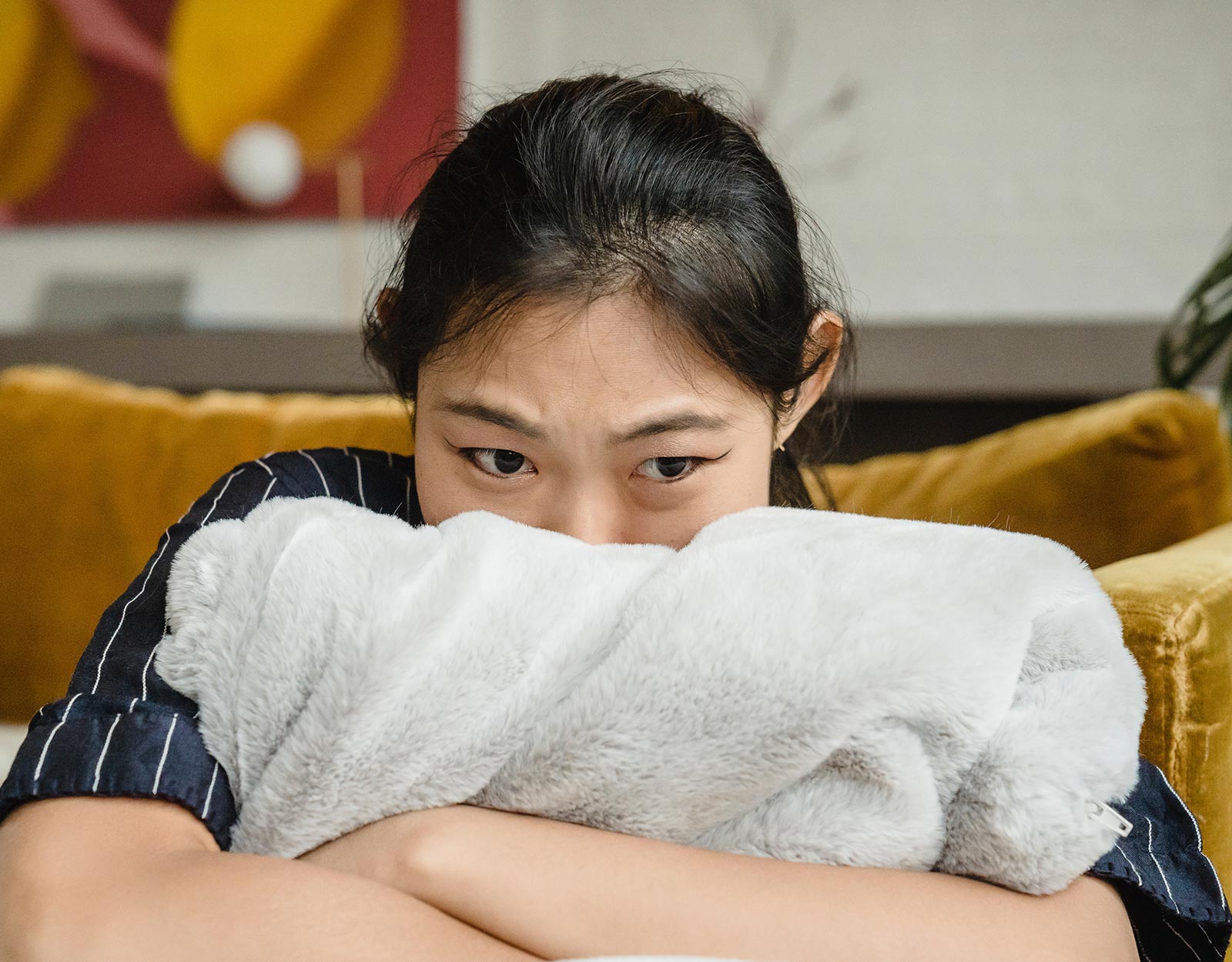 A worried woman being a people pleaser