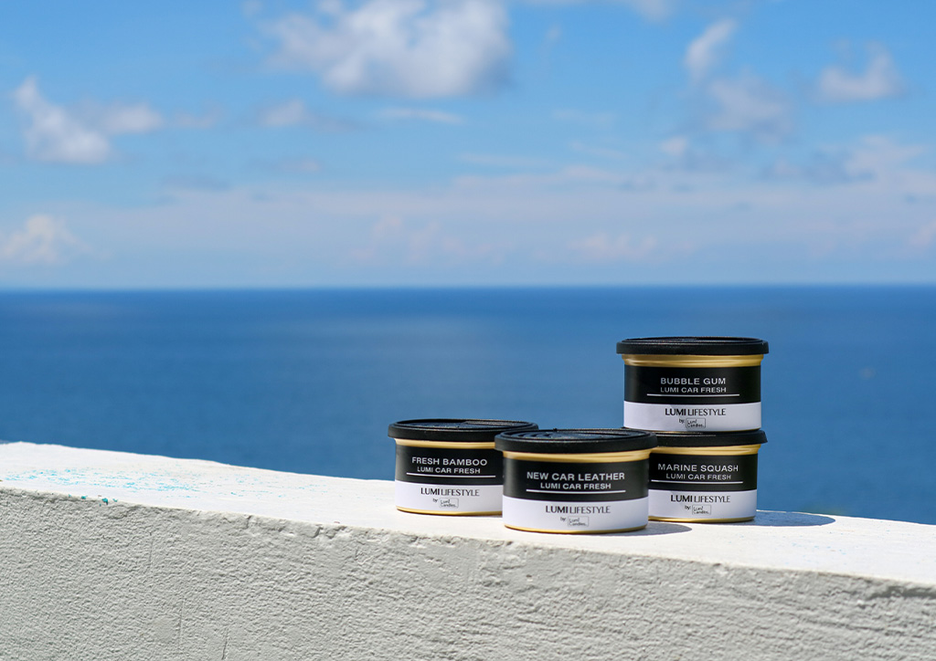 LUMI car fresheners in Fresh Bamboo, New Car Leather, Bubble Gum, and Marine Squash
