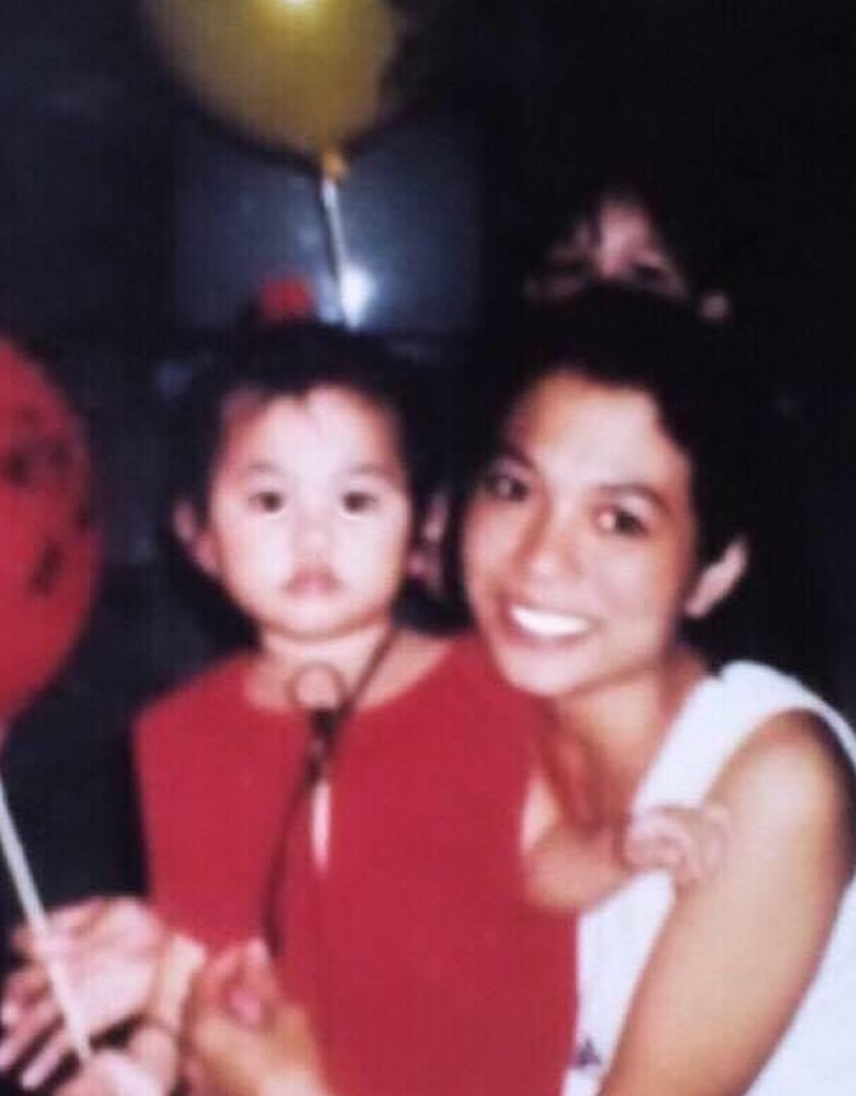 Angelica Lopez as a young girl with her mom