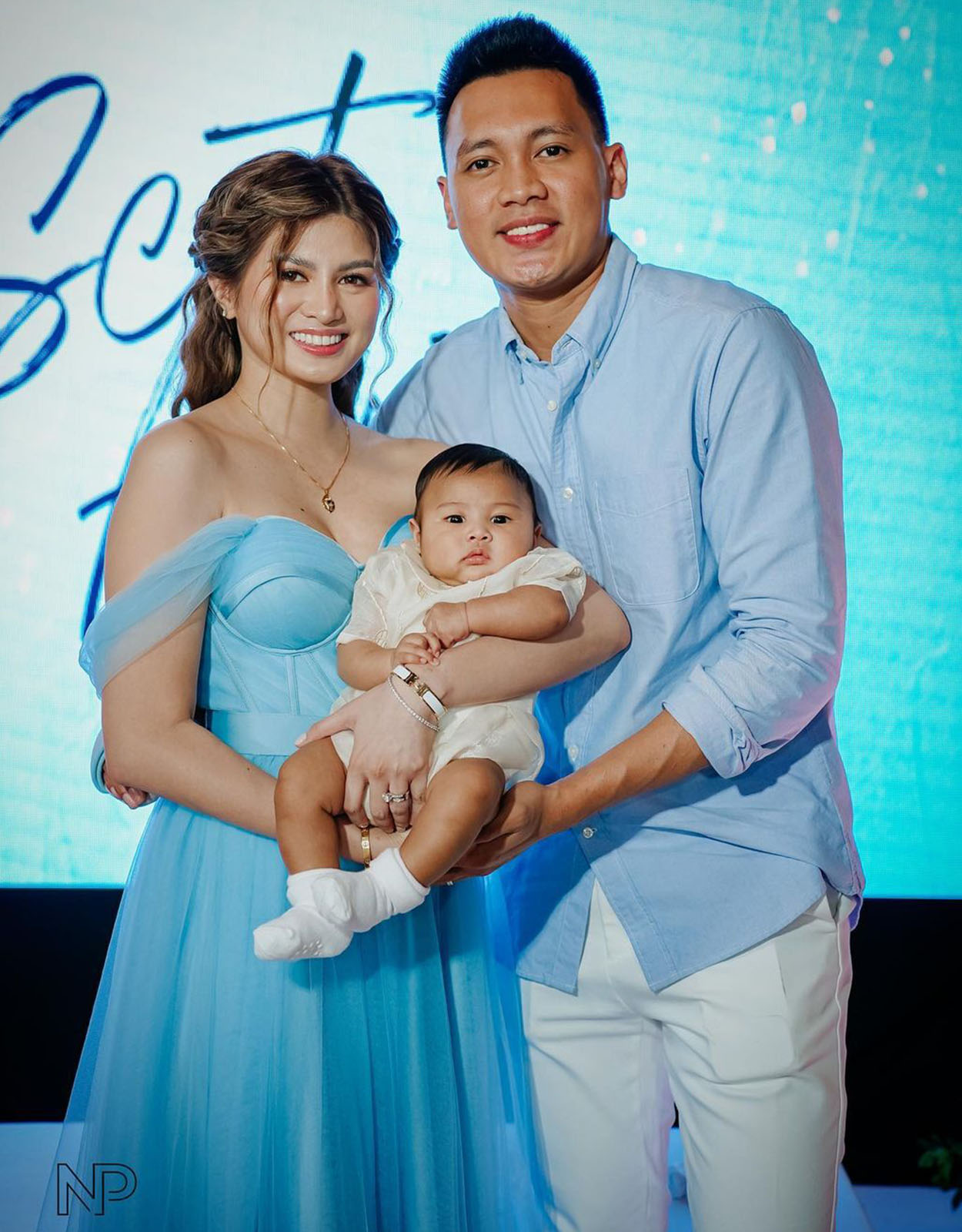 Scottie Thompson with his wife and son