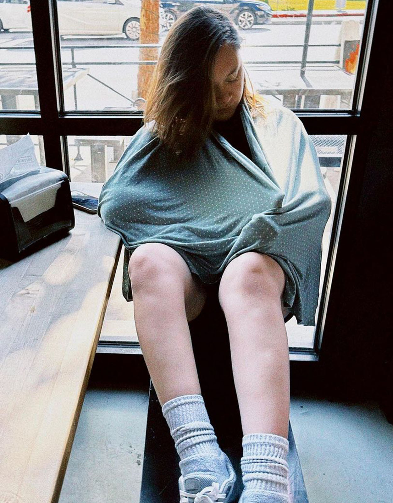 Marlann Flores breastfeeding her baby