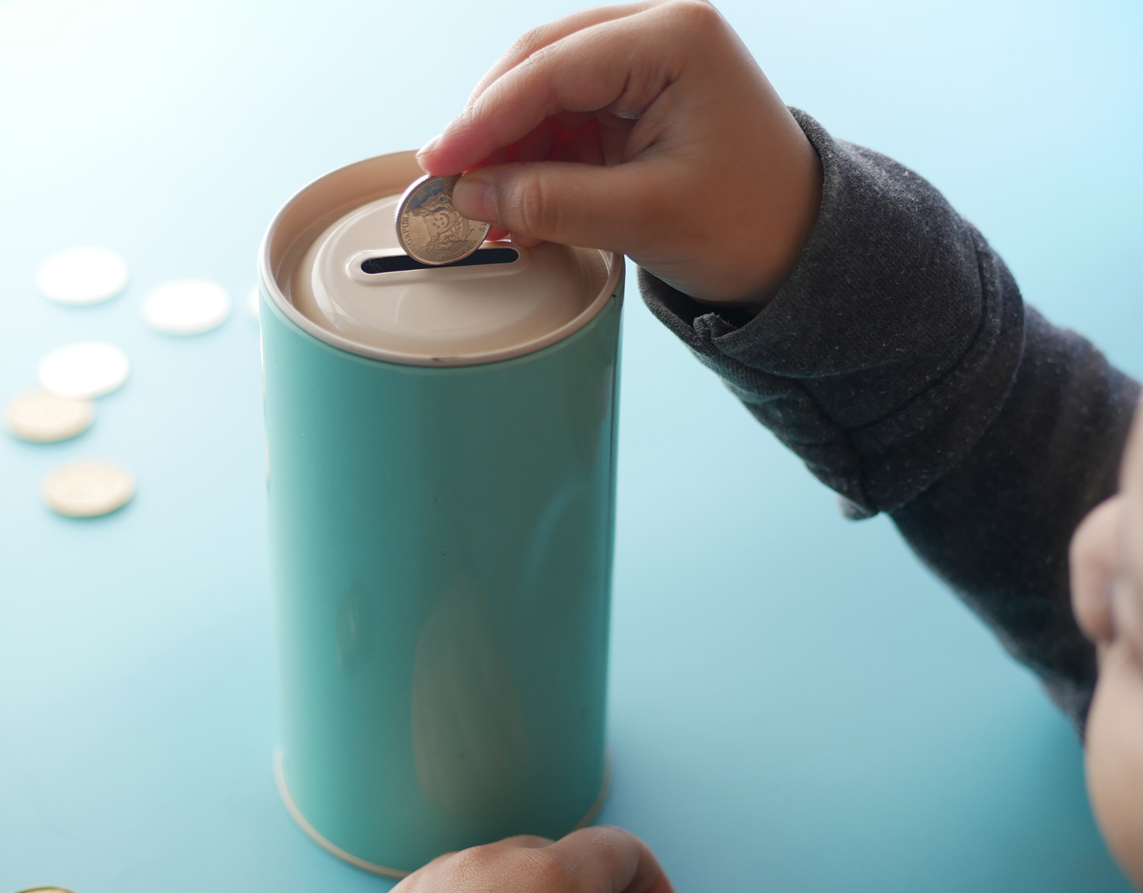 14 Ways to Teach Kids About Money, Budgeting, and Saving