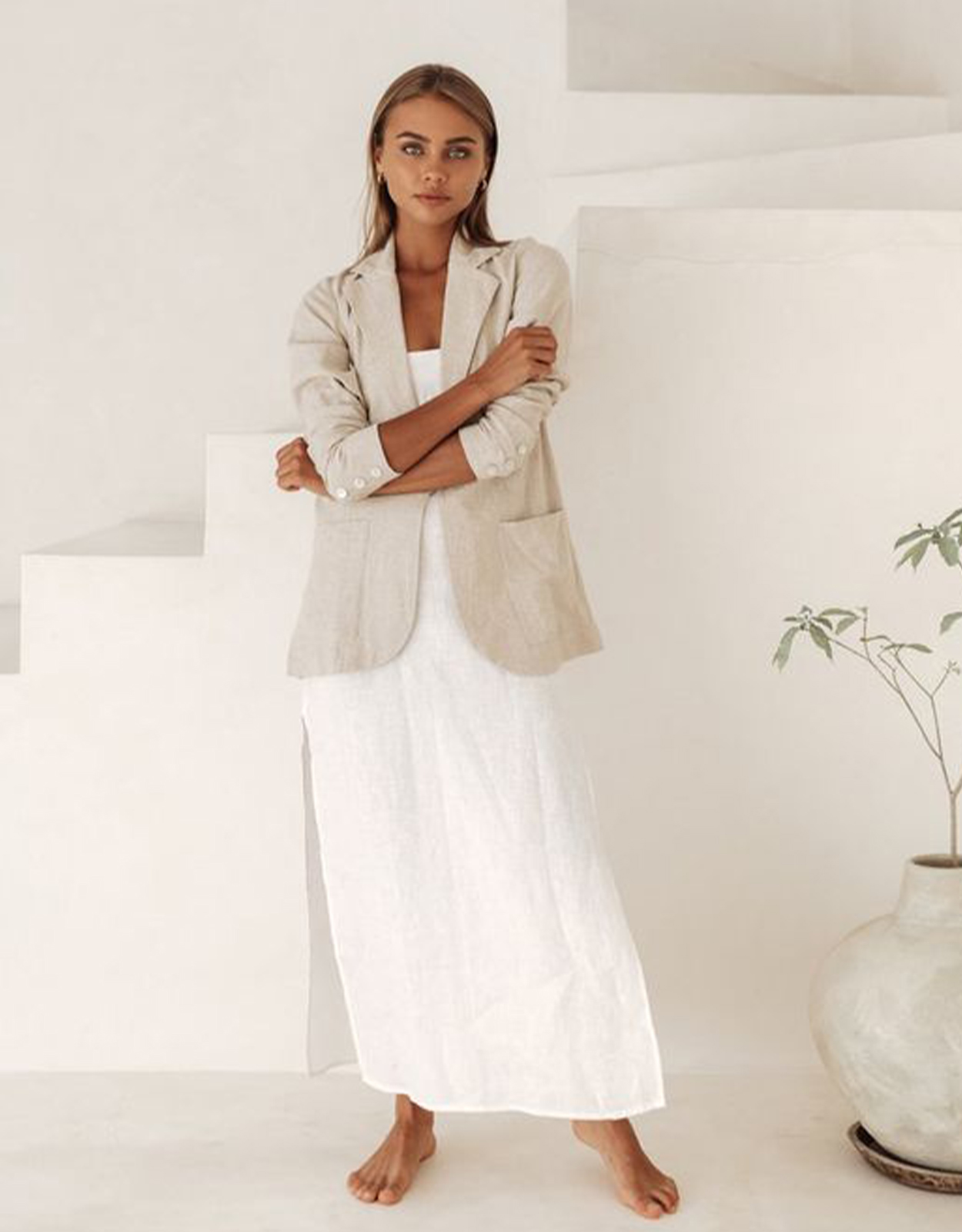 A linen dress with a cinch belt and shawl or blazer is always a classy graduation outfit idea for moms!