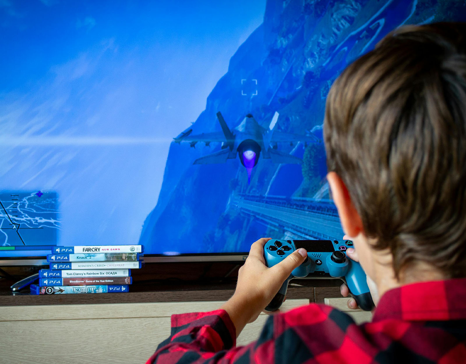 kid playing video games