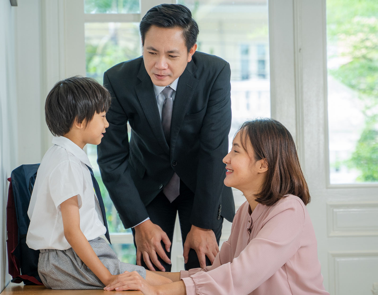 Parents talking to their kid about going to school