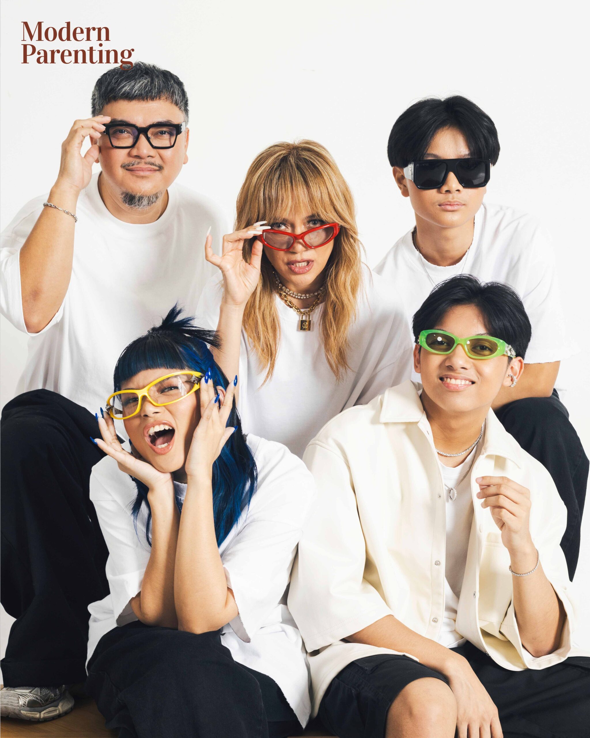 Teacher Georcelle (center) with her husband Angel, her sons Gas and BJ and daughter Jaja