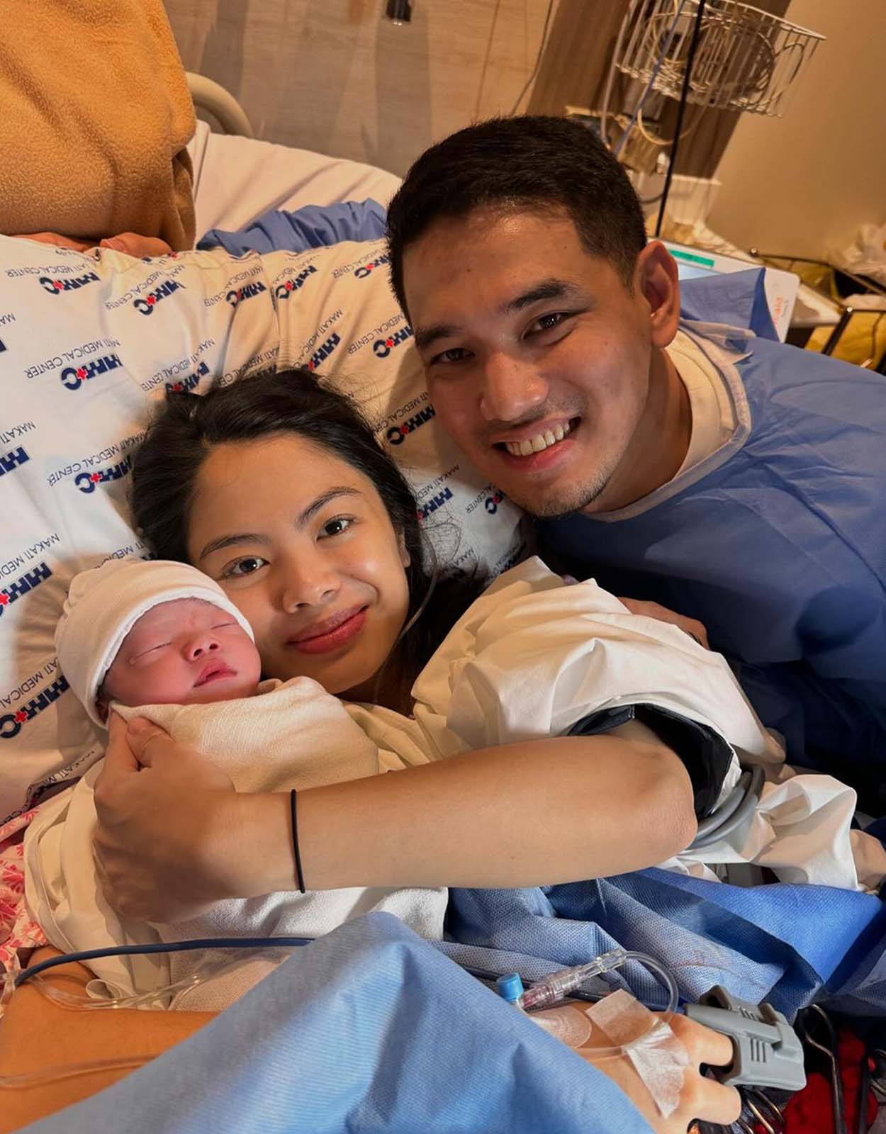 Kevin Alas and Selina Dagdag with their daughter