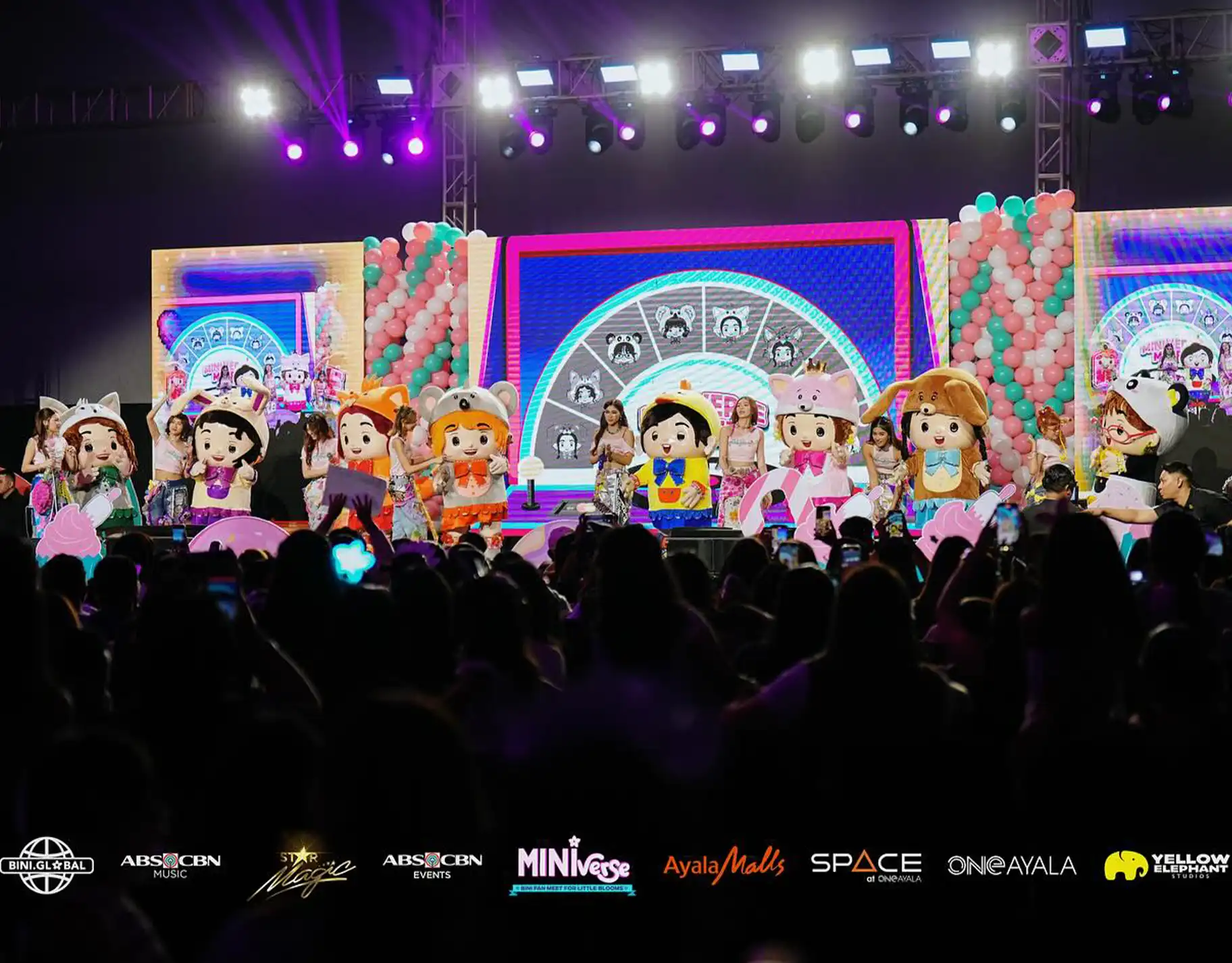 The PPop group introduces their mascots to the audience at the meet and greet for kids on April 27