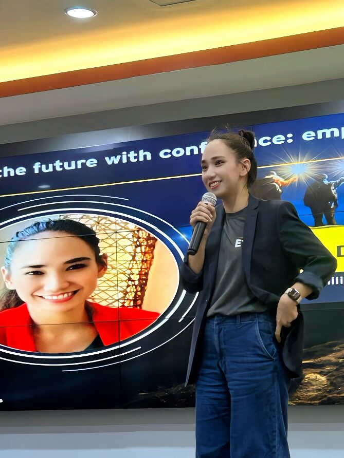 Maez De Guzman delivering a talk at a university