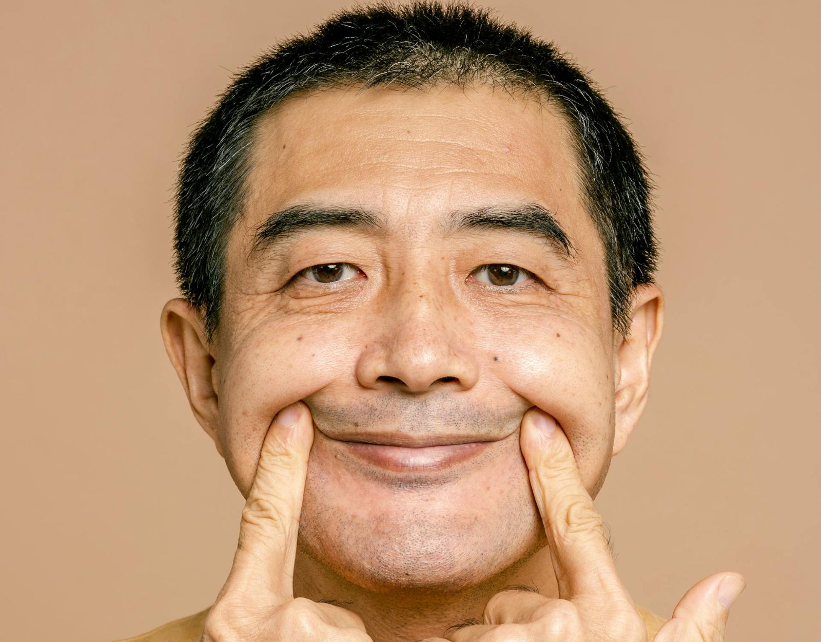 Denying is the most common stress language among Filipinos. We also call this "wearing a horseshoe" in the mouth.