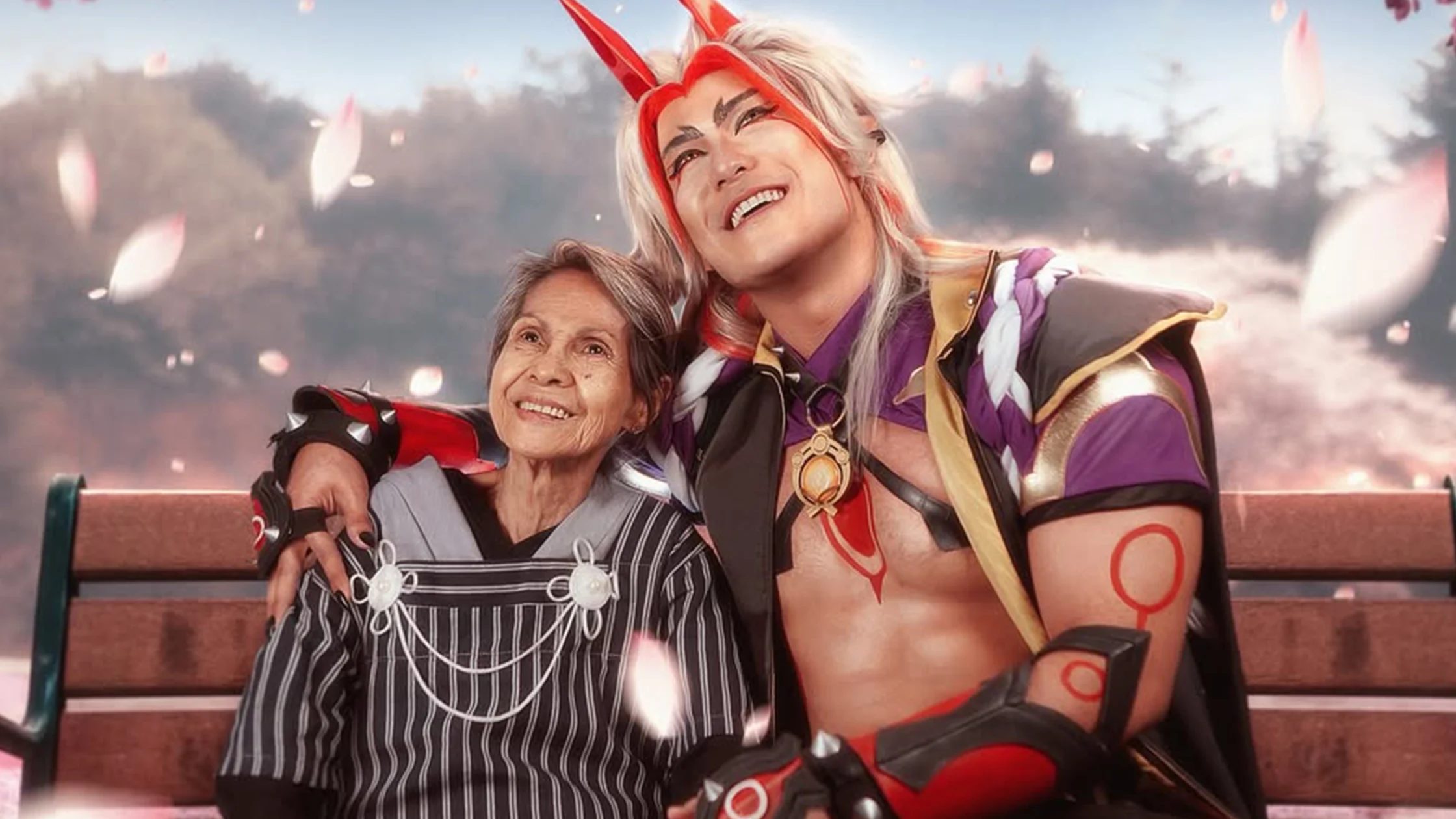Cosplayer Prince de Guzman shares on his Facebook page a sweet photoshoot of him and his grandmother cosplaying characters from popular gacha game, Genshin Impact, together