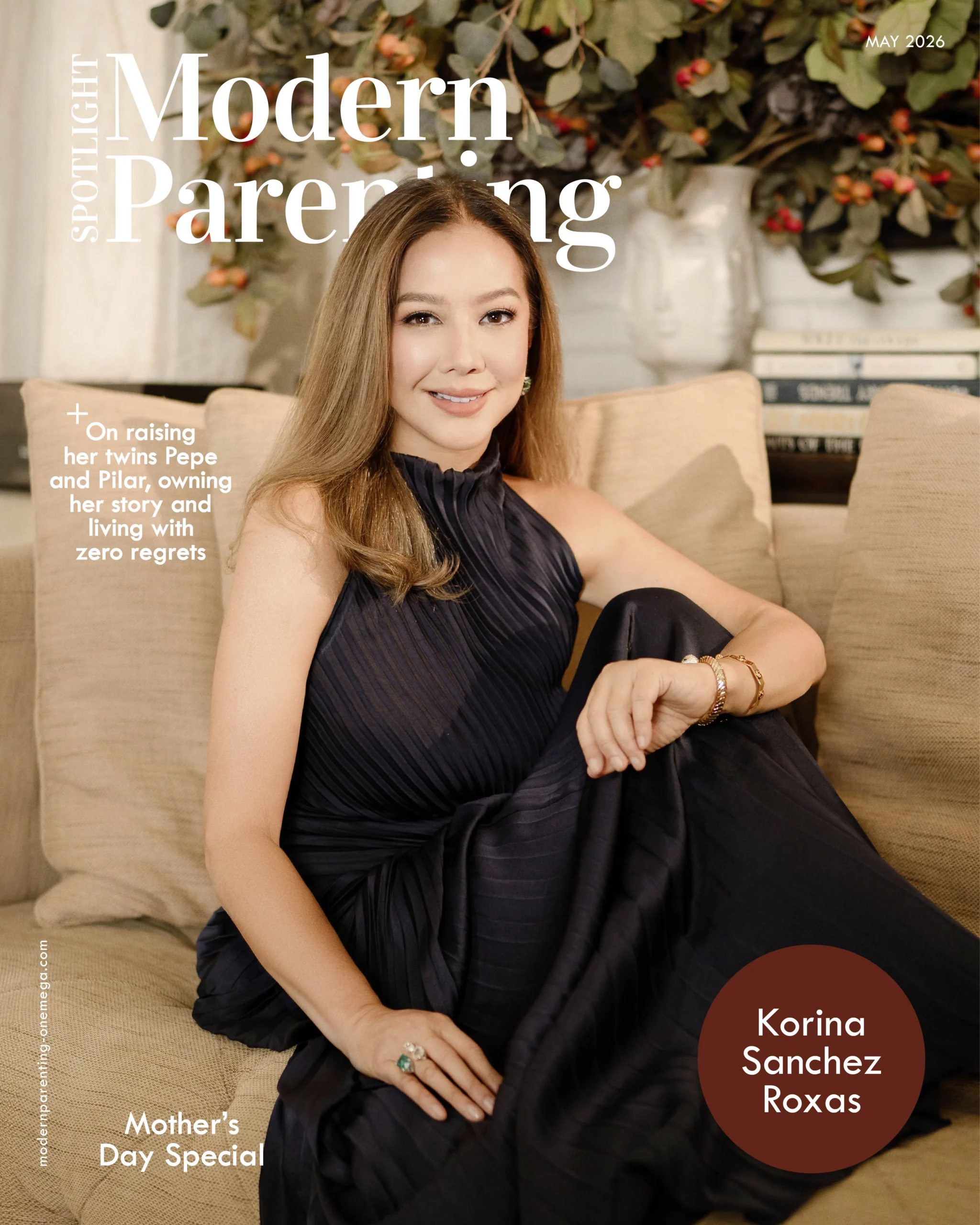 Portrait of a smiling woman in a dark dress sitting on a beige sofa with a floral backdrop, on a magazine cover reading 'Modern Parenting'.