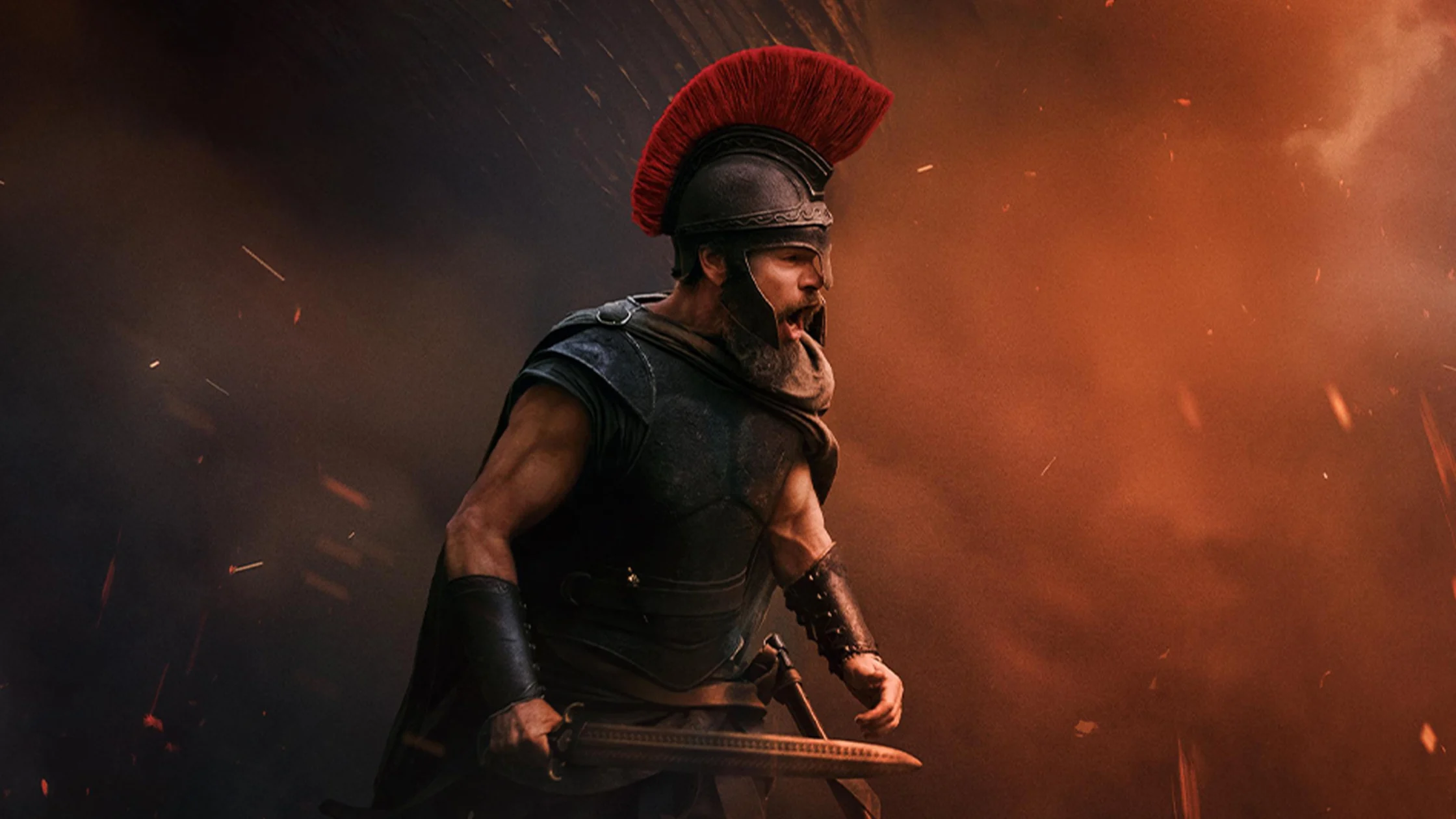 Roman soldier in armor with a red-plumed helmet, shouting as he charges through smoke and flames.